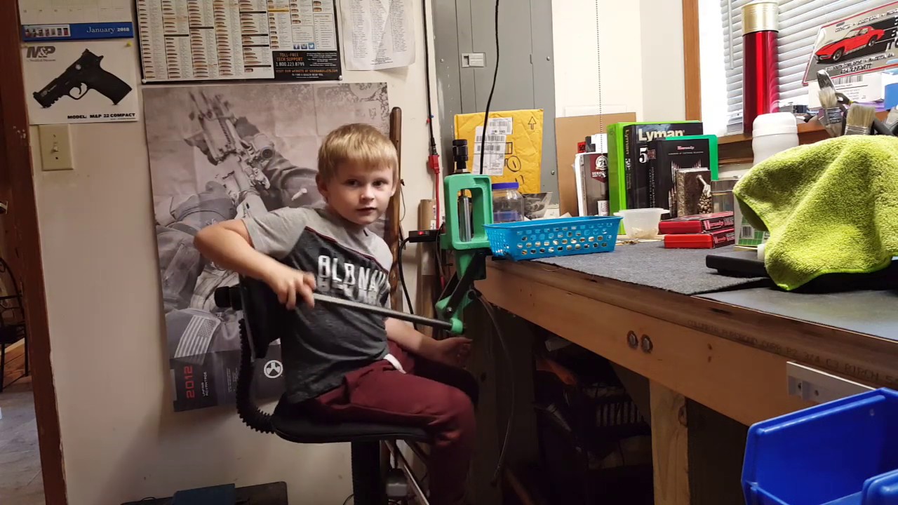 Great Grandson. Caden decapping 5.56 brass