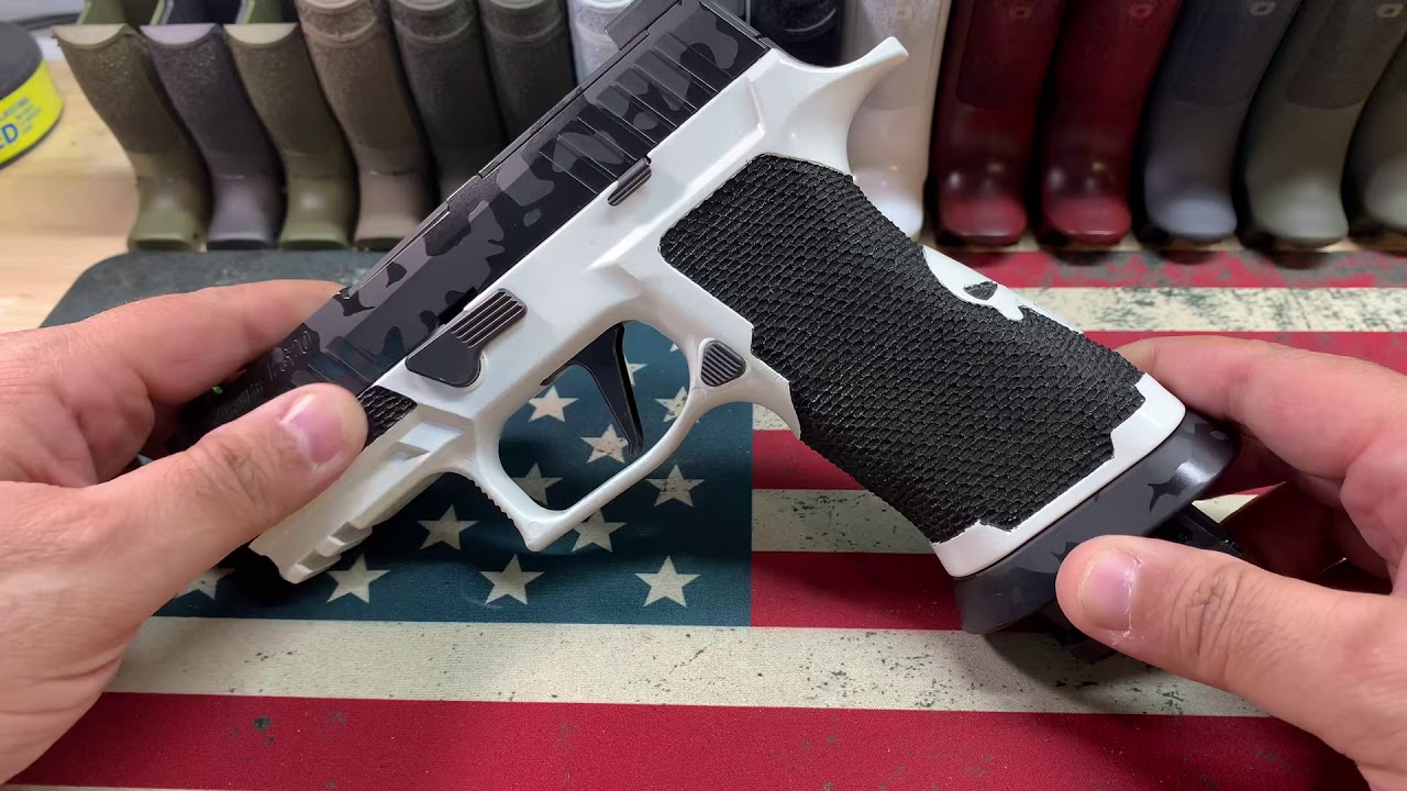 Xcompact with defender series grip with punisher skull available from Frank Castle Customs