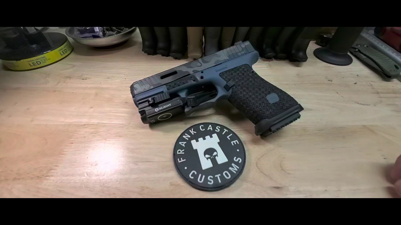 Glock 19 with frank castle customs package #1 (stippling and slide cuts $350)