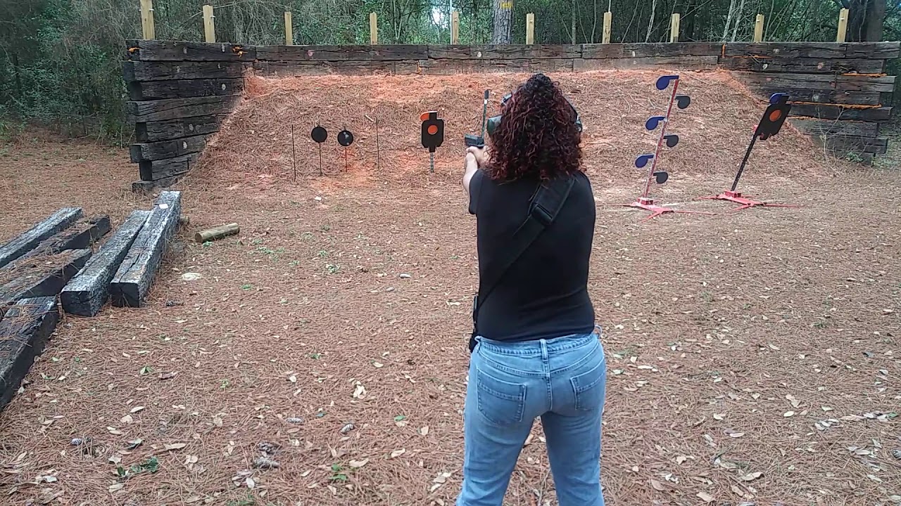 Wife drawing and taking precision shot 10 yrds